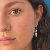 Curling sterling silver drop earring