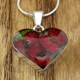 Small poppy heart silver pendant