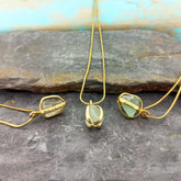 Three gold plated chain necklaces with Fluorite in brass claw clasp