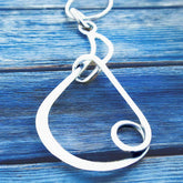 Handmade silver looped teardrop pendant