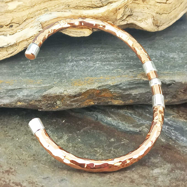 Hammered copper cuff bracelet with silver detail