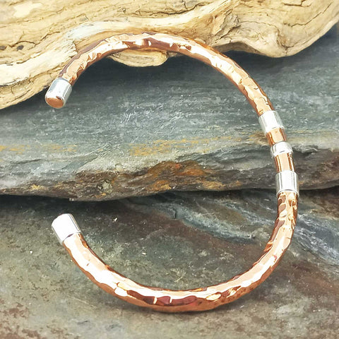 Hammered copper cuff bracelet with silver detail