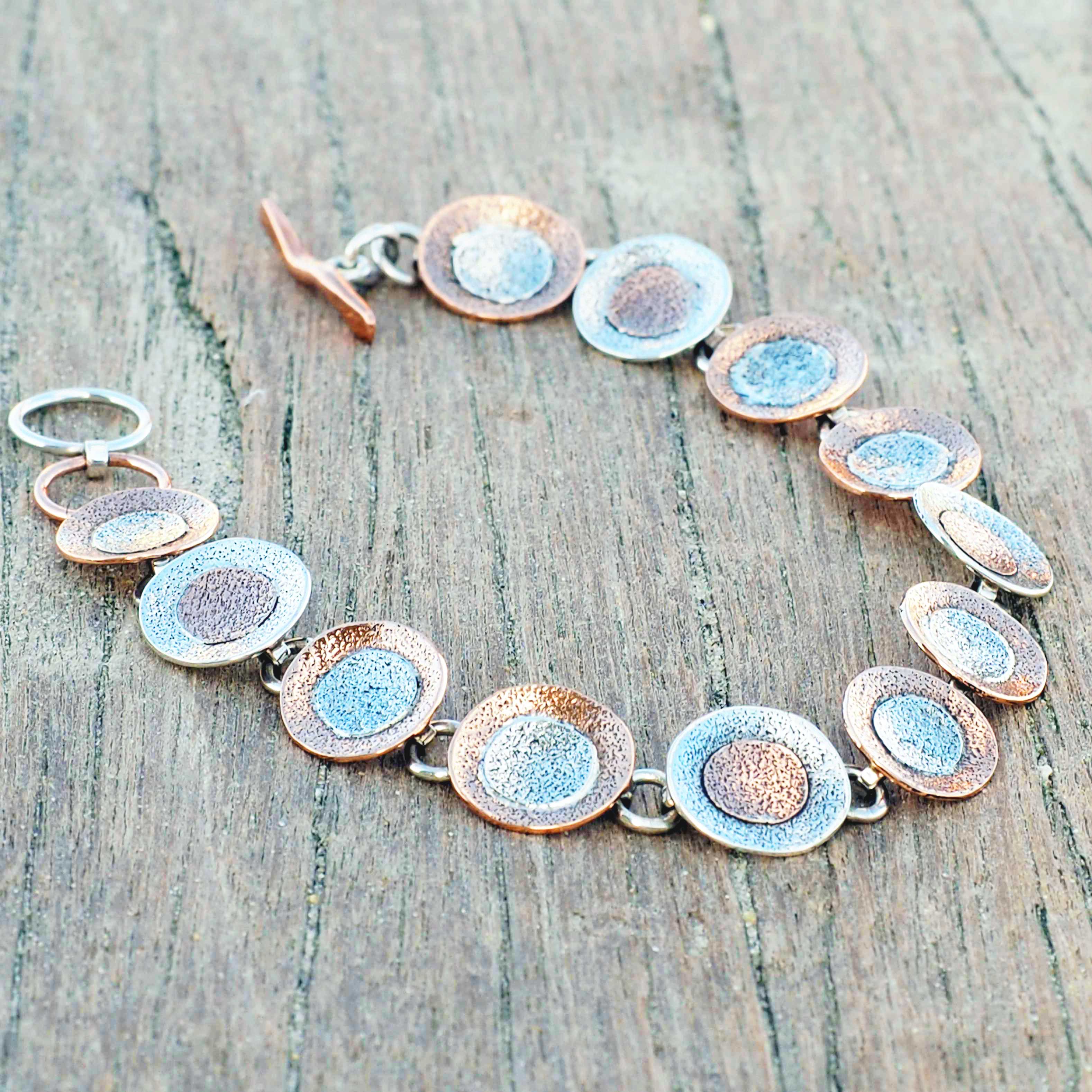 Unusual copper silver disc bracelet
