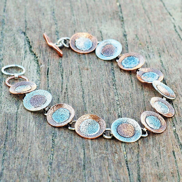 Unusual copper silver disc bracelet