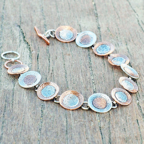 Unusual copper silver disc bracelet