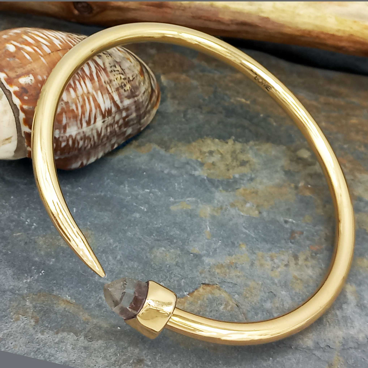 Unusual copper brass bangle with quartz