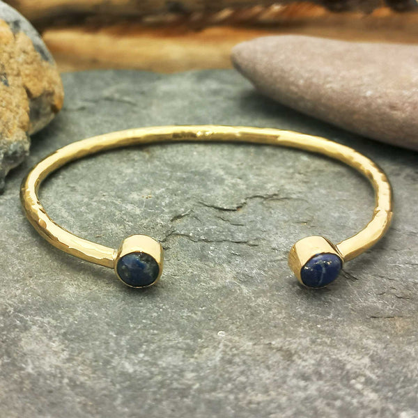 Unusual Gold coloured cuff bracelet with Lapis stones