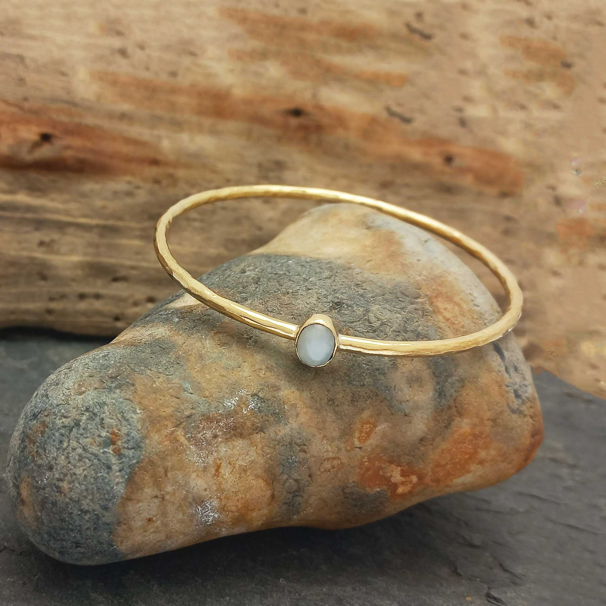 Unusual handcrafted golden bracelet with Moonstone gemstone.