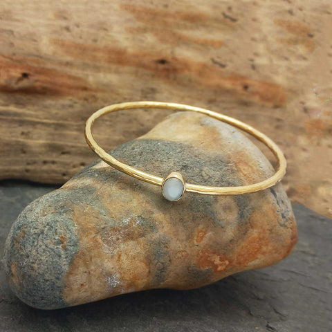 Unusual handcrafted golden bracelet with Moonstone gemstone.