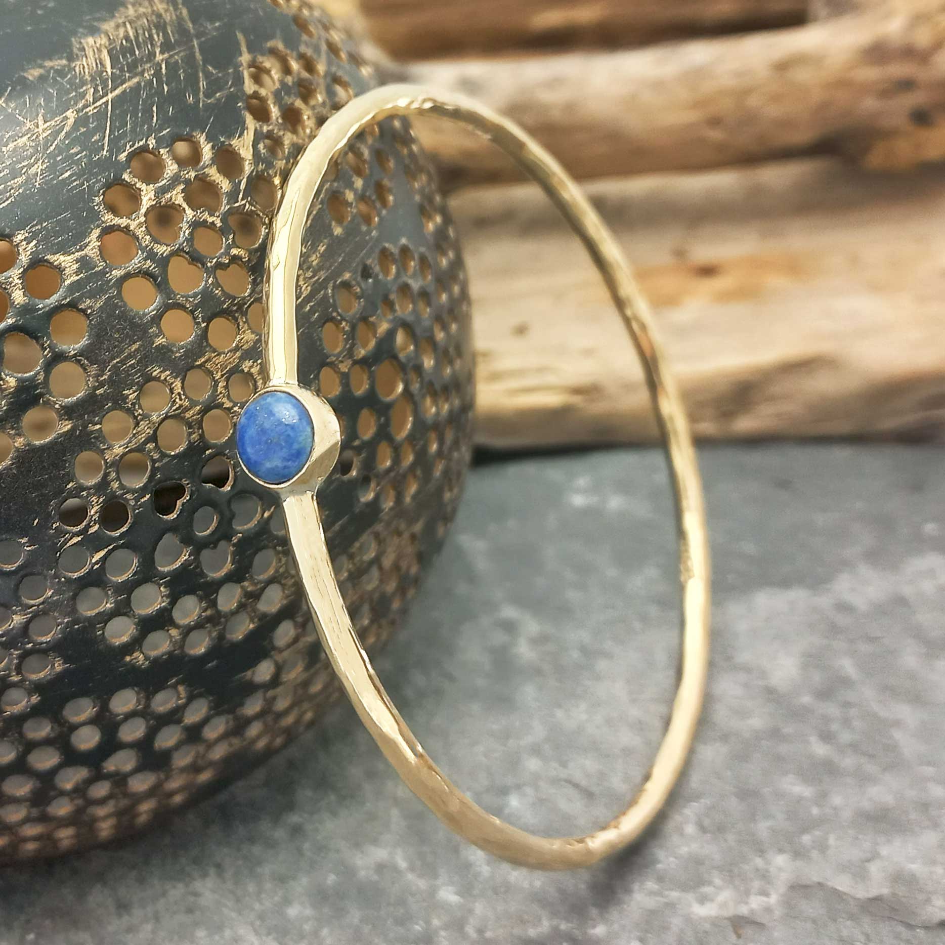 Unusual hammered bangle with Sodalite