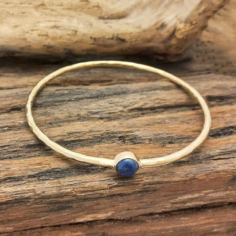 Textured brass bangle with Sodalite stone