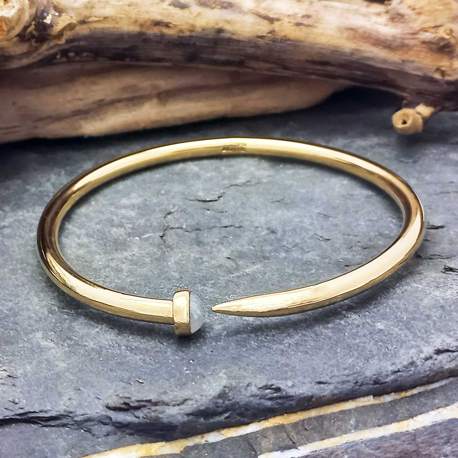 Unusual brass open bangle with Moonstone