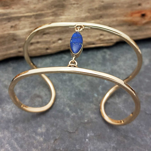 Handcrafted unusual brass cuff with Lapis stone