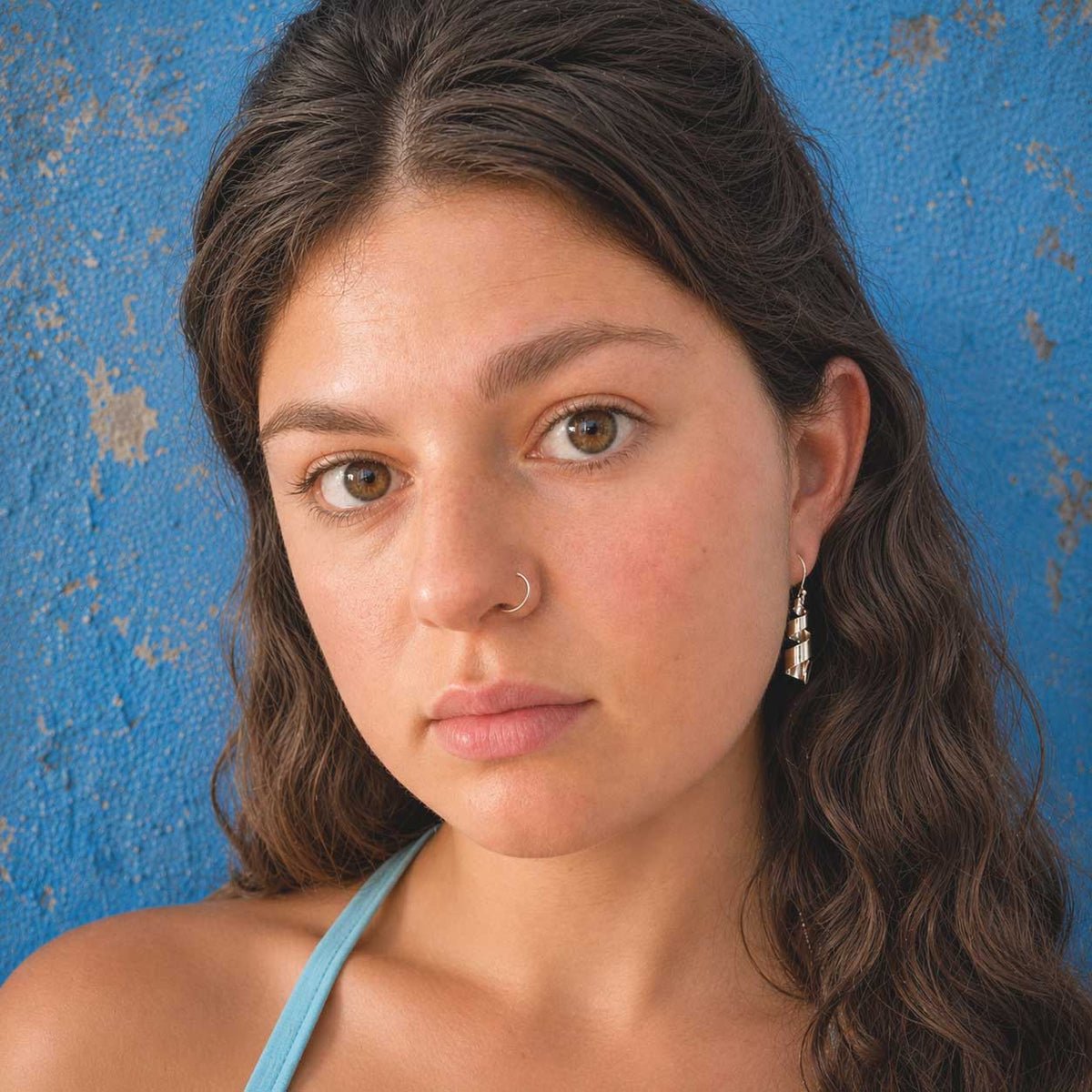 Handcrafted Mexican silver twist drop earring.