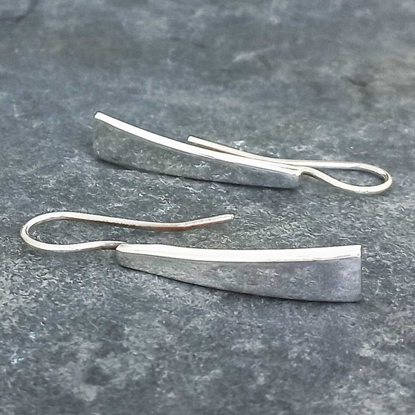 Polished strip sterling silver handmade drop earrings on stone