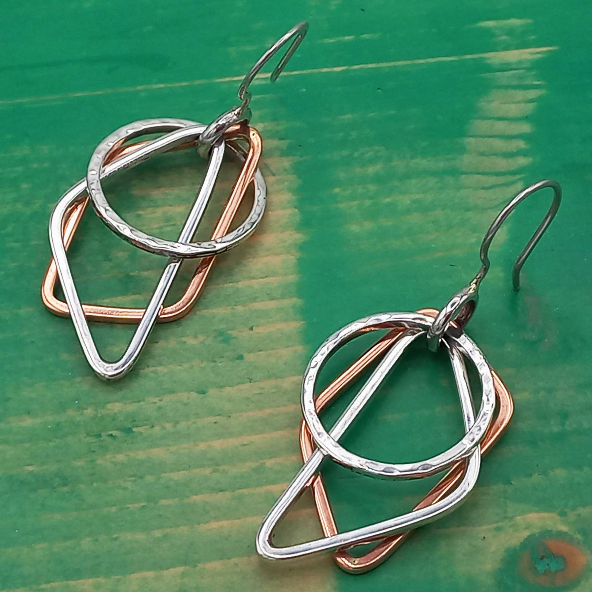 Statement handmade silver copper earrings
