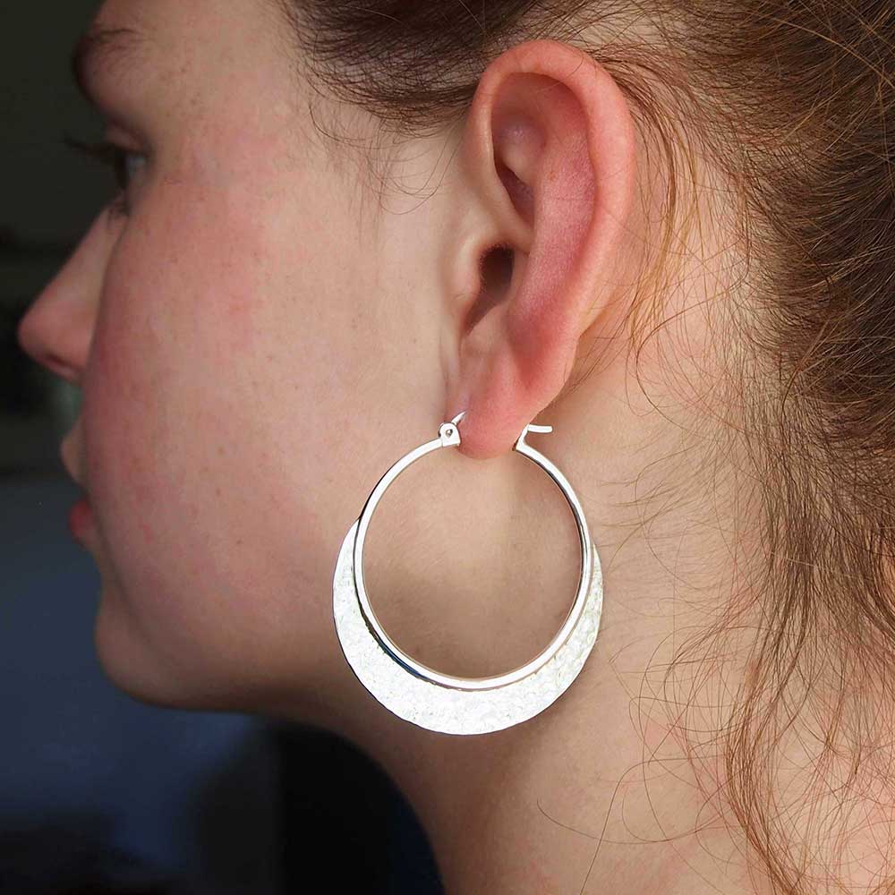 Hammered large sterling silver hoops Main image