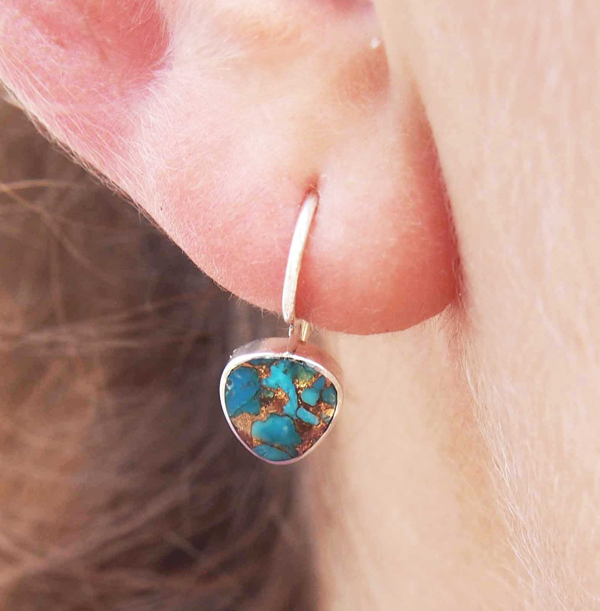 Dainty handmade silver earrings with turquoise bronze