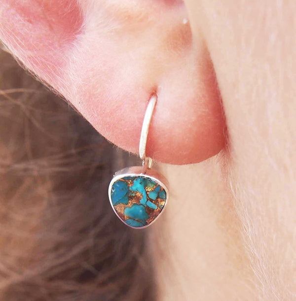 Dainty handmade silver earrings with turquoise bronze