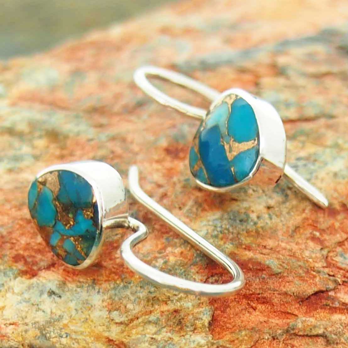 Unusual silver drop earrings with turquoise