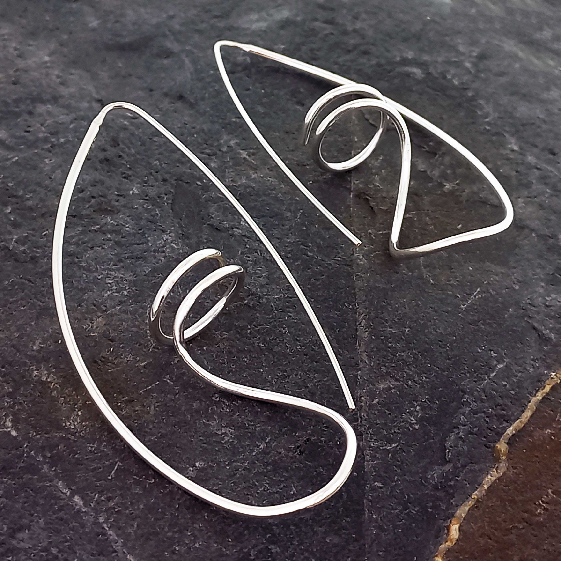 Long unusual silver corkscrew earrings
