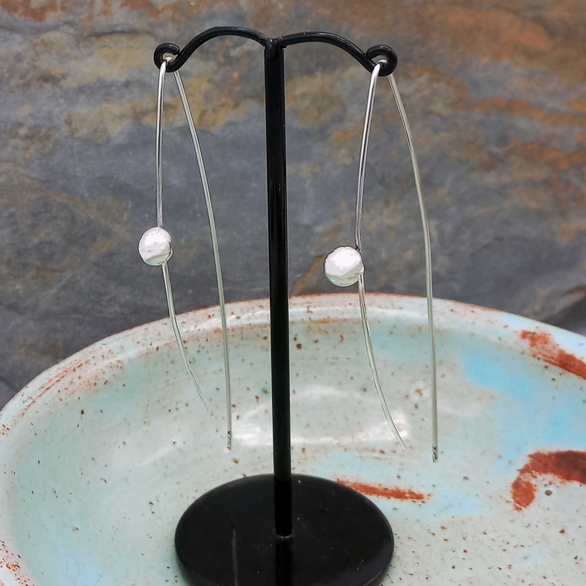 Unusual silver ball pull through earrings