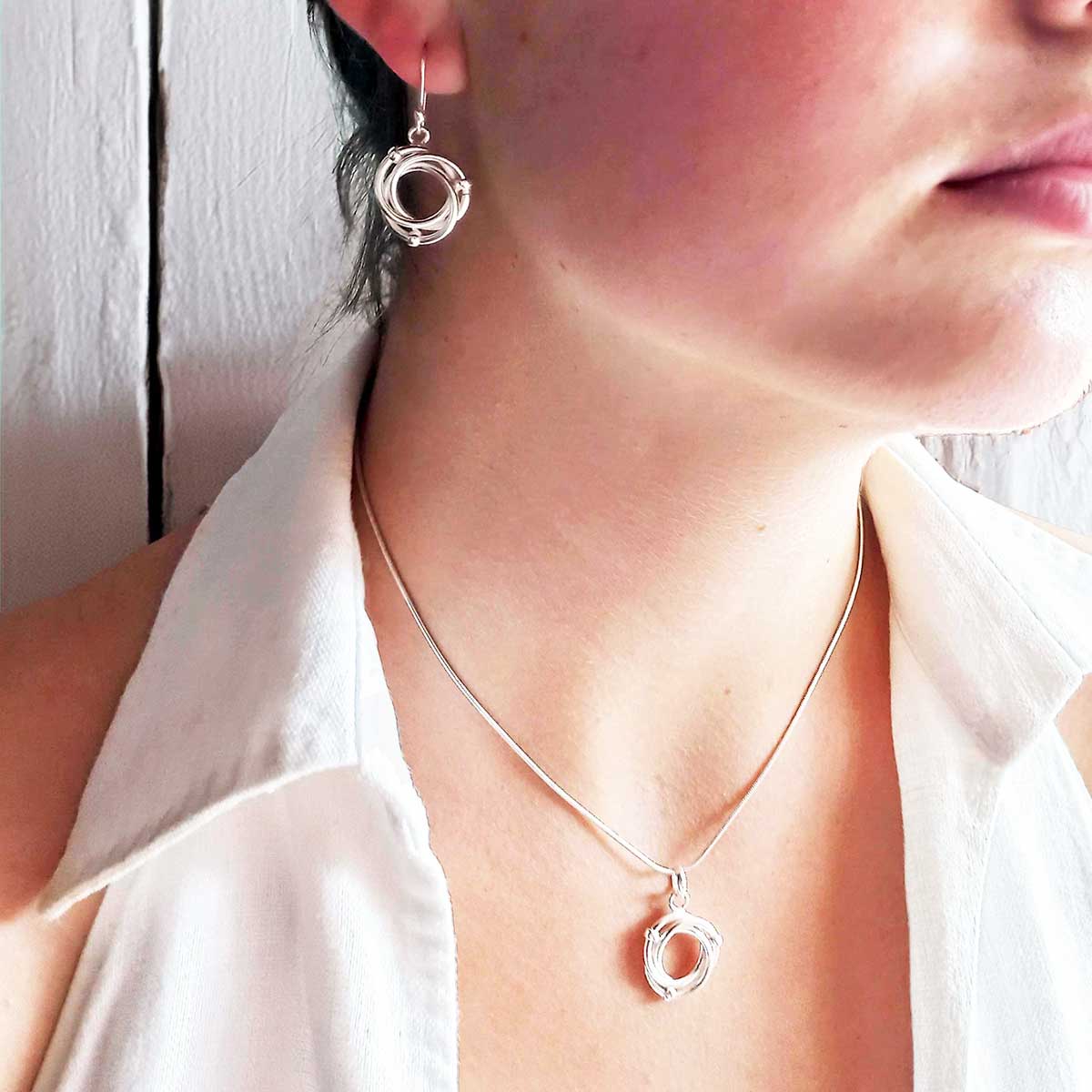 Entwined circles sterling silver earrings and pendant set
