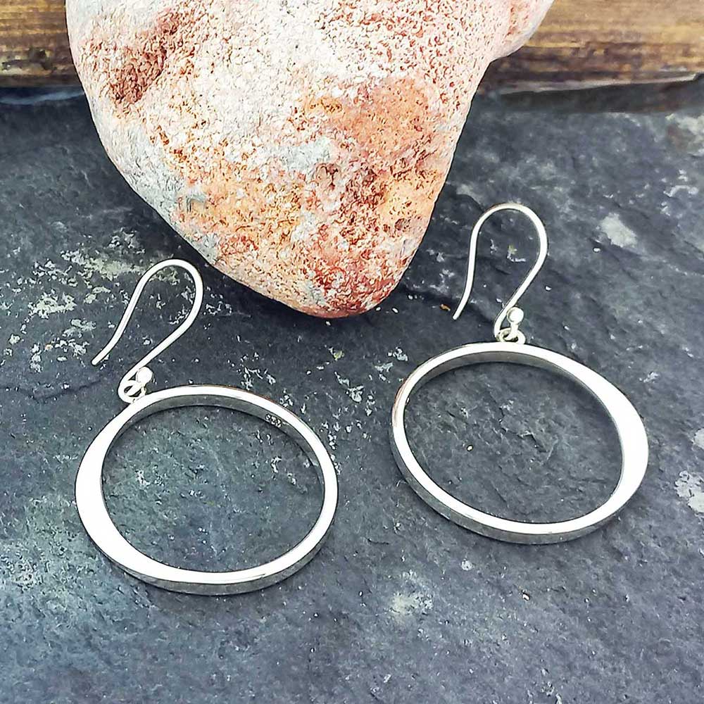 Handmade silver circle dangle earrings Main image