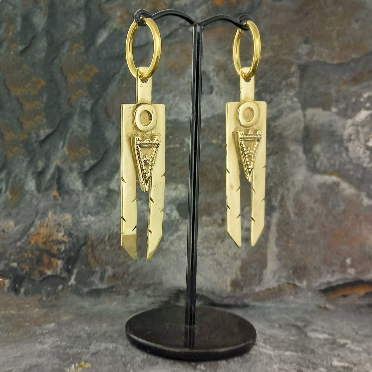 Long, statement brass Aztec earring on gold plate hoop