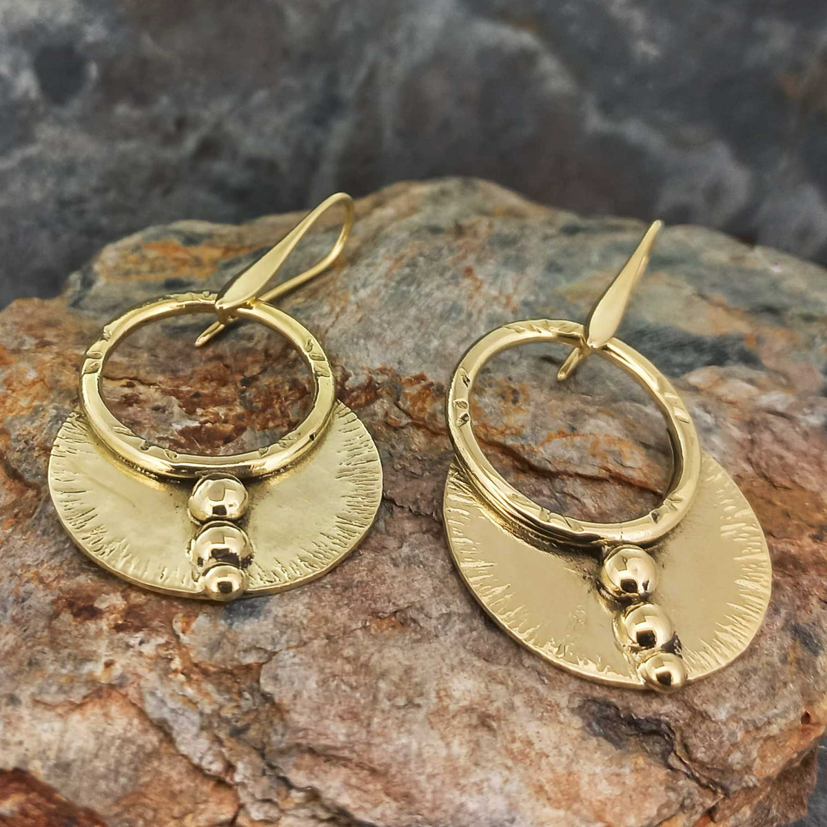 Handmade unusual brass earrings with hand working detail