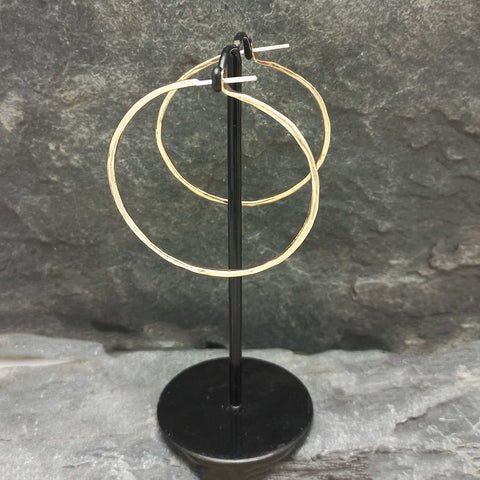 Light gold coloured brass hoop earrings