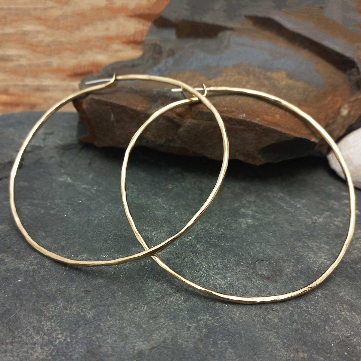 Handmade large statement brass hoops Main image