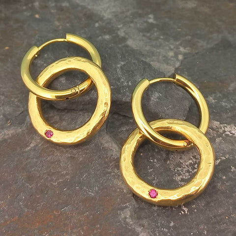 Textured contemporary gold-plated earring hoops with red glass cabochon