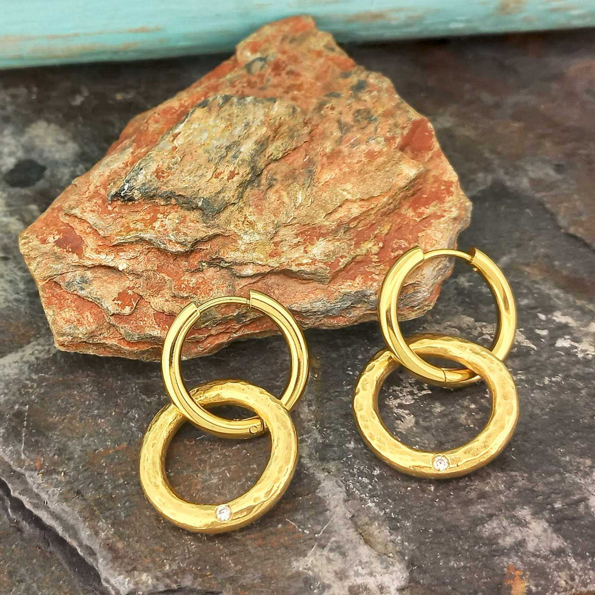 Rings of Fire with white glass cabochon artisanal earrings Main image