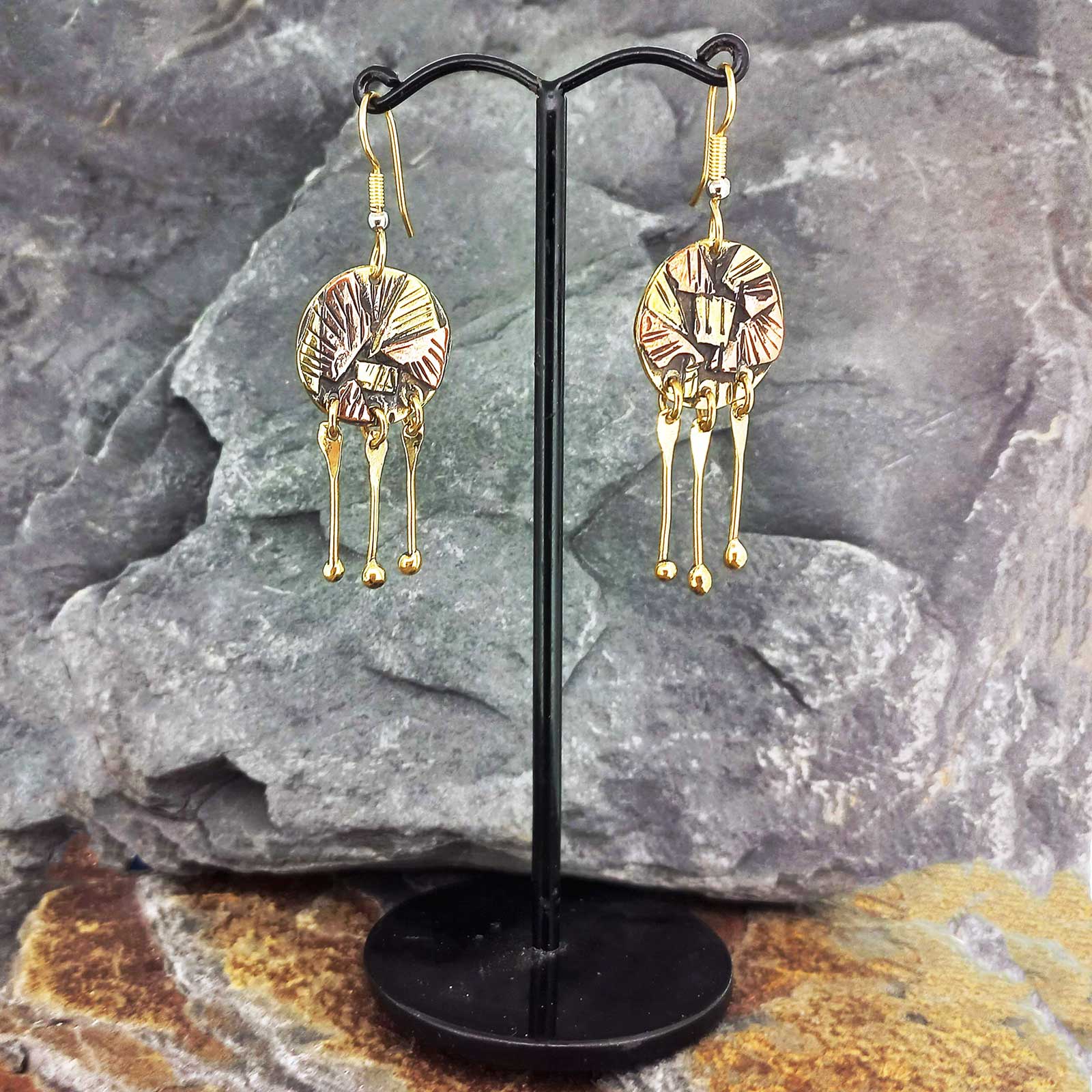 Unusual sunbeam golden drop earrings
