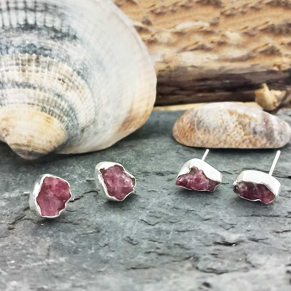 Different versions of rustic ruby stud earrings