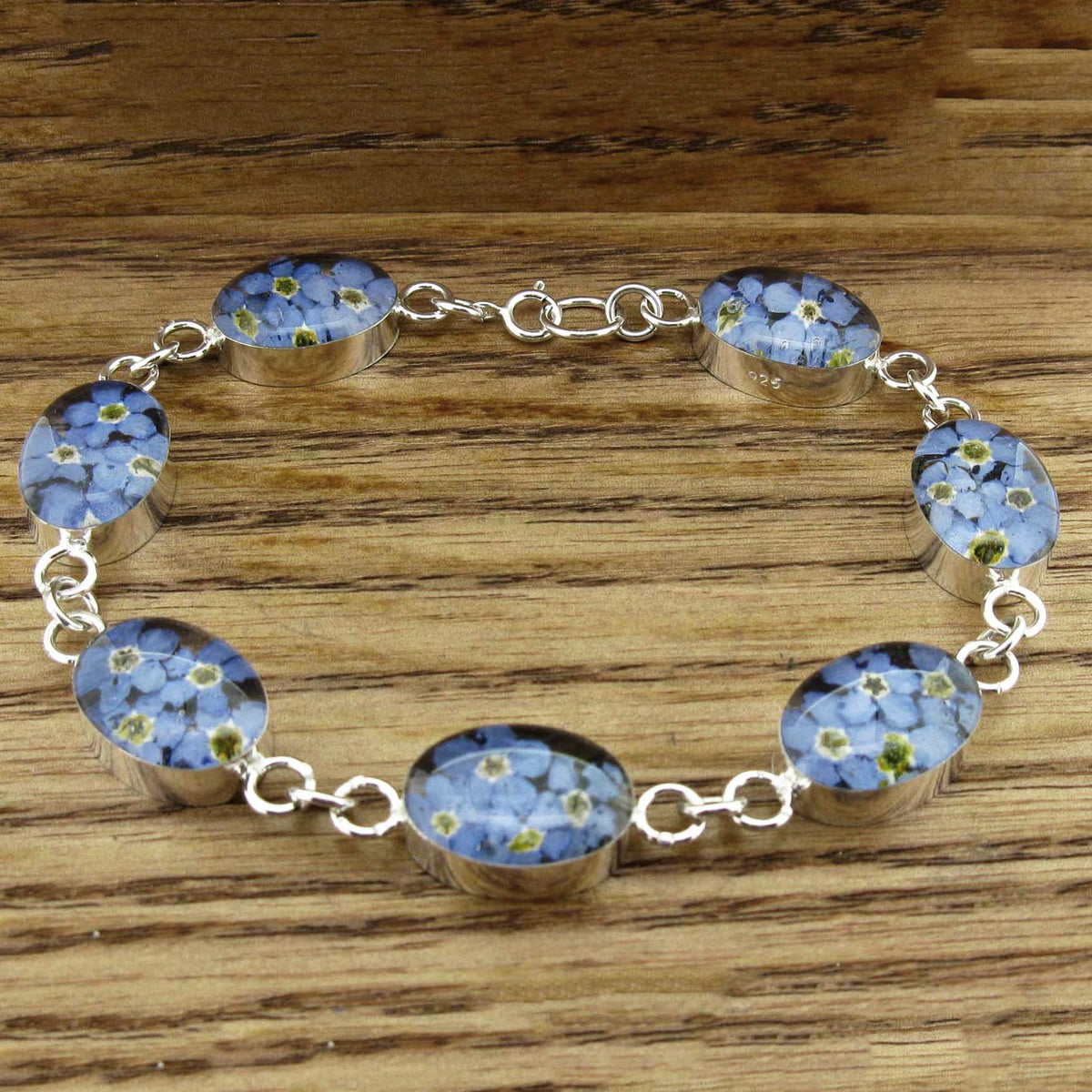 Oval silver link bracelets with Forget-me-not