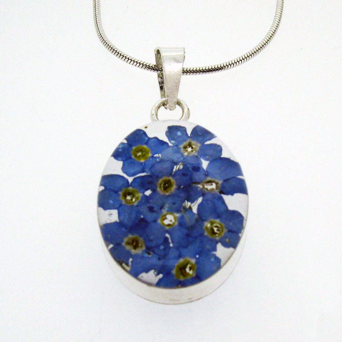 Handmade silver oval pendant with Forget-me-not flowers