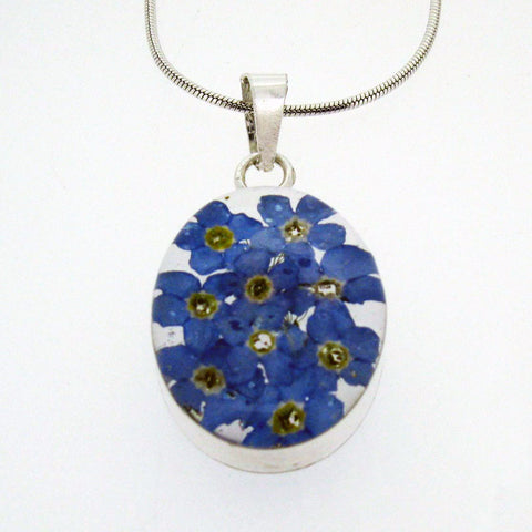 Handmade silver oval pendant with Forget-me-not flowers