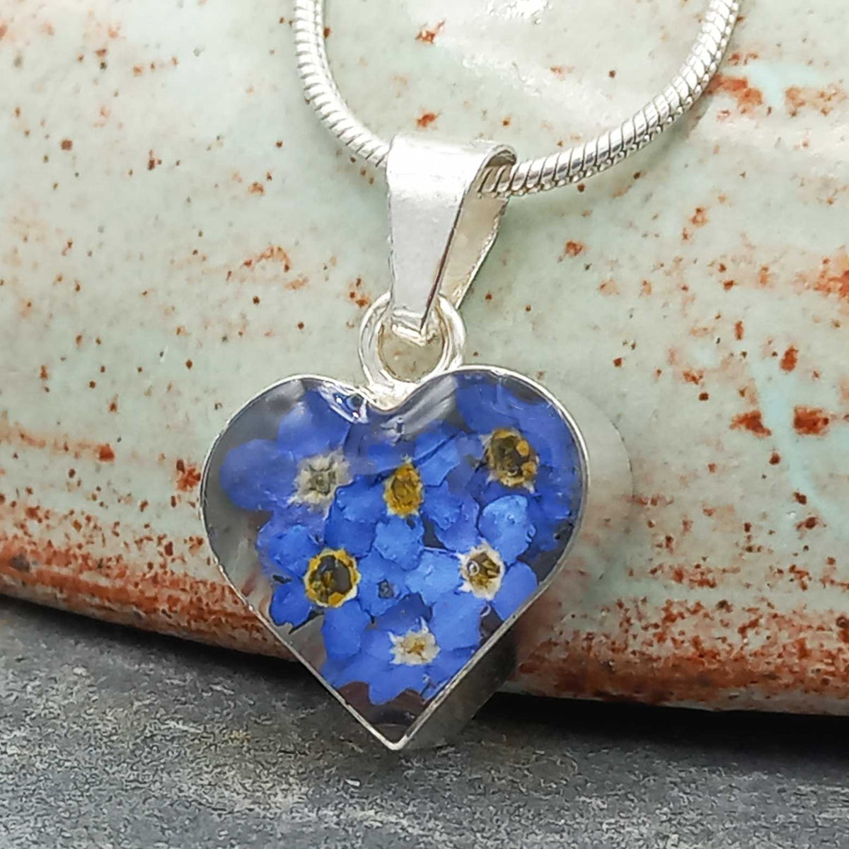 Handmade silver heart with forget-me-not flowers