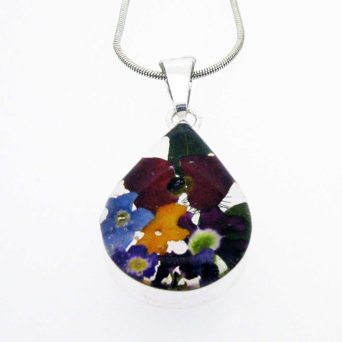 Handmade silver pendant with real flowers