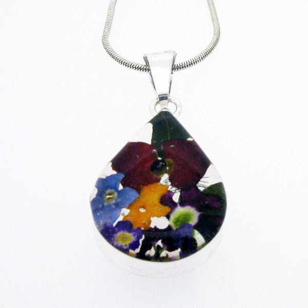 Handmade silver pendant with real flowers