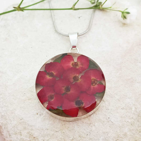 Round silver necklace with red real pressed poppy flowers