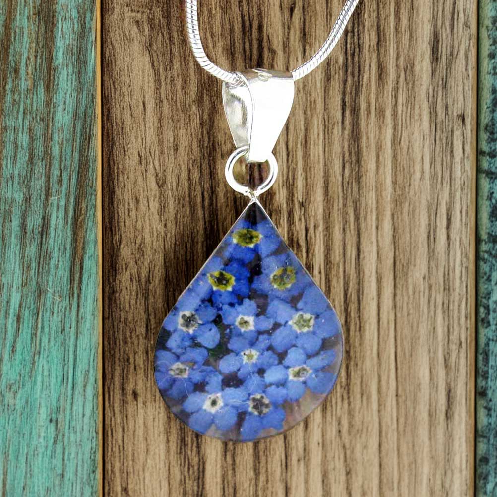 Teardrop silver pendant with real forget-me-not flowers Main image