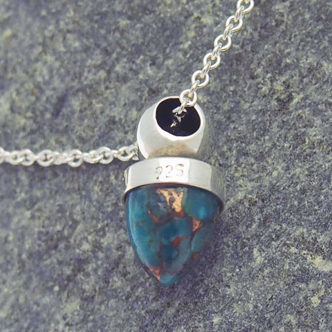 Silver necklace with turquoise acorn