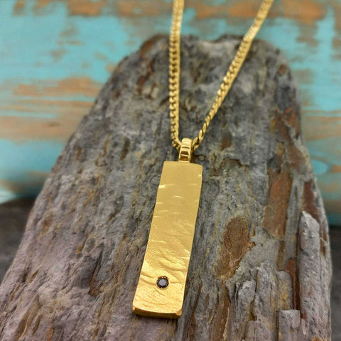 Statement handmade gold plated necklace with black glass cabochon