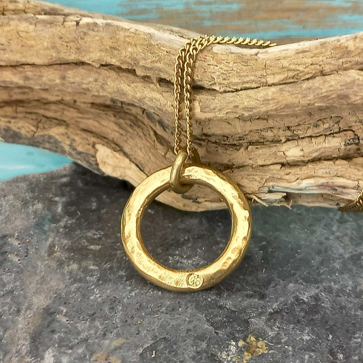 Rings of Fire Gold-plated necklace with glass stone Main image