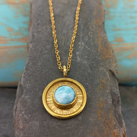 Gold hued brass necklace with gold-plated chain