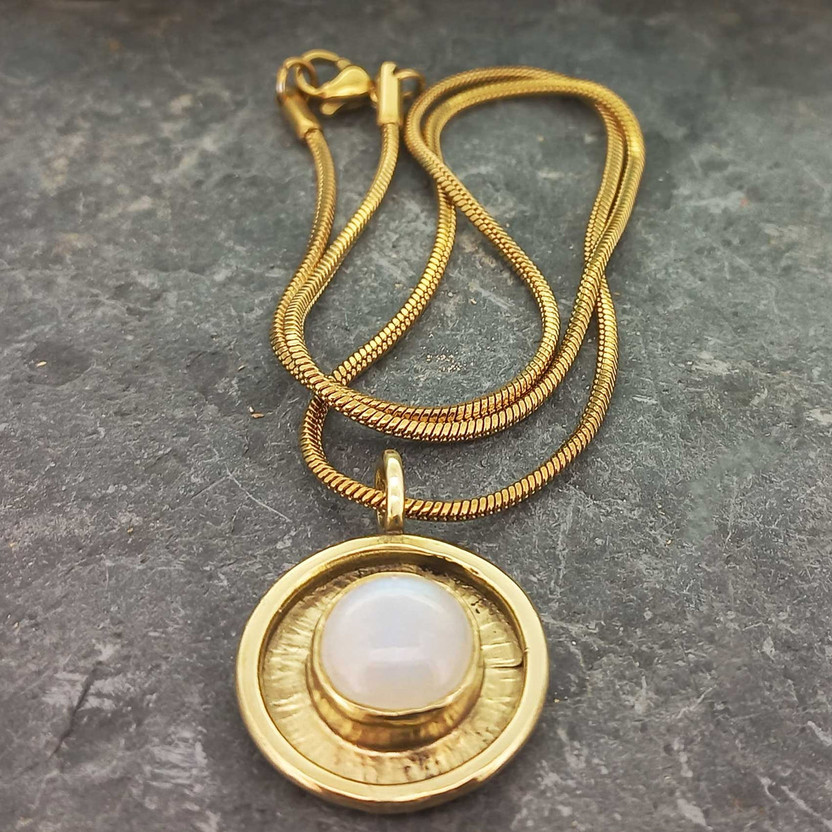 Handmade ethnic sun pendantwith Moonstone