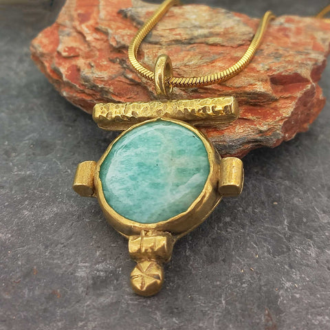Gold coloured brass pendant withAmazonite stone with gold plated chain
